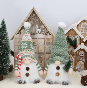 Detail of Christmas gnomes with knitted hats, white beards and festive accessories