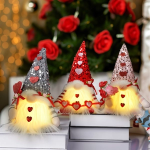 Three glowing Valentine Gnomes with sequin hats and heart patches on a cozy background