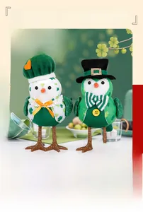 Close-up of Saint Patrick's Day plush birds with green leaf patterns and festive hats