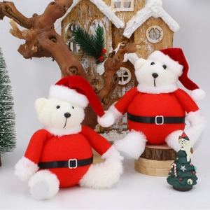 Cute white plush Christmas teddy bear in red Santa outfit for holiday decoration and gifts