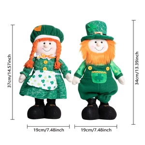 Detailed size chart for St. Patrick's Day plush dolls featuring green shamrock designs
