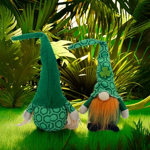 St. Patrick's Day gnomes with green shamrock hats on grass for festive home decoration