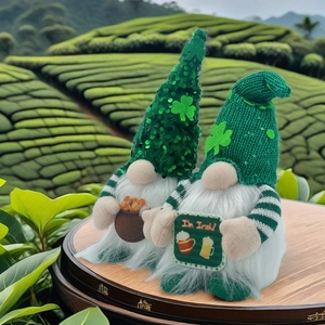 St. Patrick's Day gnomes with green sequin hats and clover decor on wooden tray