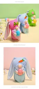 Close-up of Easter faceless gnomes with bunny ears holding colorful polka dot eggs