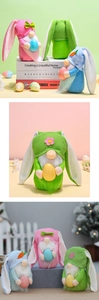 Detailed close-up of three colorful Easter gnomes holding speckled eggs for home decor