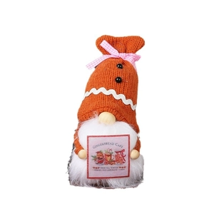Knitted gnome plush with Gingerbread Cafe sign for festive coffee bar decorations