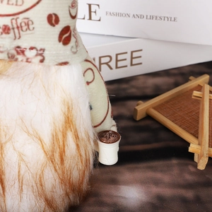 Rudolph coffee gnome plush with knitted green hat and white cup for Christmas decor