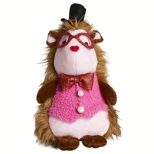 Detail of plush beaver doll with black top hat, red sequin glasses and pink fleece vest