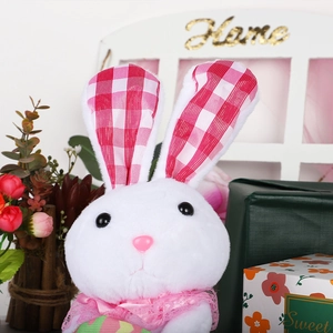 Close-up of white plush bunny with pink plaid ears and lace collar for Easter decor