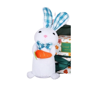 Light-up plush Easter bunny ornament with carrot and blue checkered bow on a gift background
