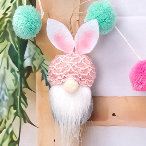 Pink handmade crochet Easter gnome with bunny ears and white beard hanging ornament