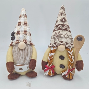 Pair of coffee-themed gnomes with knitted hats and coffee bean accents for home decor