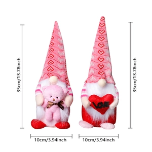 Pair of pink Valentine's Day gnomes with plush hearts and bears, standing 35cm tall