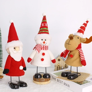 Cute Christmas figurines set with Santa, Snowman, and Reindeer on spring metal legs