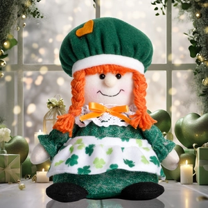 St. Patrick's Day plush doll detail with green clover apron and orange braids
