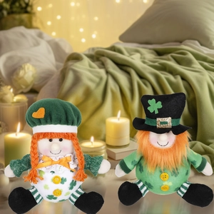 Macro detail of St. Patrick's Day plush dolls with green shamrock prints and warm decor