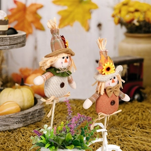 Charming autumn scarecrow garden stakes set with pumpkins and maple leaf harvest decor
