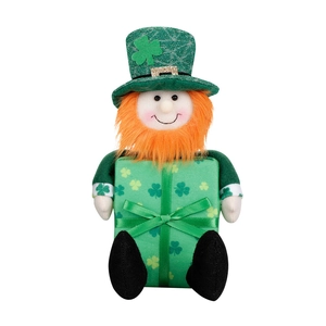 St. Patrick's Day plush gnome holding a clover gift box with orange beard detail