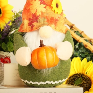 Fall gnome decoration with maple leaf hat and pumpkin for Thanksgiving harvest home decor