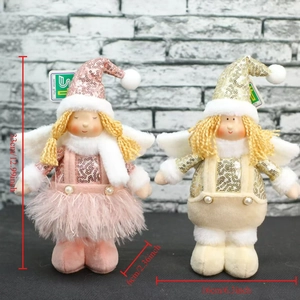 Detail of plush Christmas angel dolls with sequins, feather skirts and pearl buttons