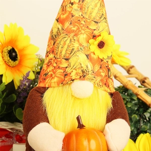 Detailed close-up of a harvest gnome holding an orange pumpkin with fall leaf patterns