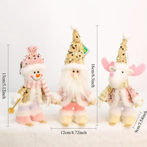 Detail showing pink sequined Christmas plush dolls snowman reindeer and Santa Claus