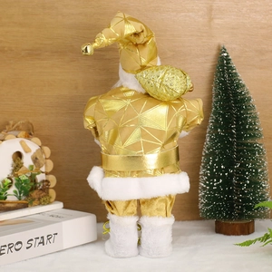 Back view of a standing Santa Claus figure in gold textured suit with a gift bag