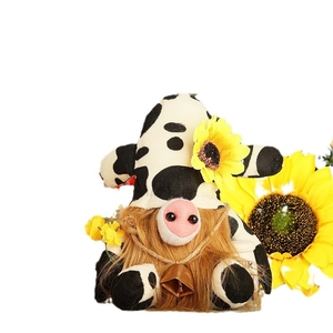 Cute farm cow themed gnome plush with sunflower hat, brown beard and small bell