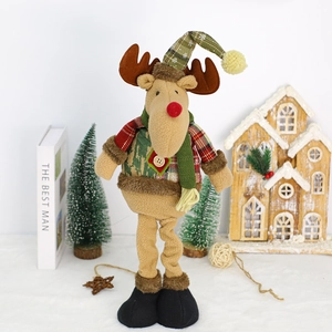 Standing reindeer Christmas plush doll featuring red and green plaid fabric and a green scarf