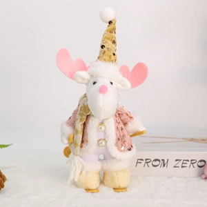 Close-up of pink sequined Christmas reindeer plush doll with golden hat and skis