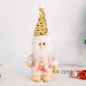 Detailed view of Santa plush with sequined gold hat and pink suit on miniature skis