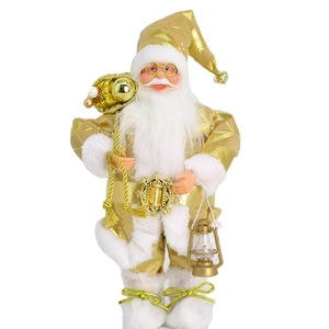 Standing Santa Claus doll in champagne gold and white outfit with a gift bag and lantern