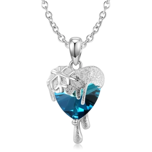 Y2K S925 zilveren hartketting met blauwe zirkoon en smeltend sneeuwvlokdetail op wit