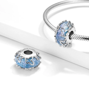 S925 Sterling Silver Blue Butterfly Charm with Glitter Enamel and Filigree Design