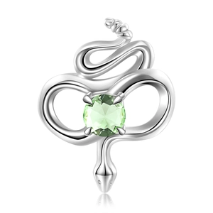 Macro view of S925 silver rattlesnake charm featuring a brilliant green zircon inlay