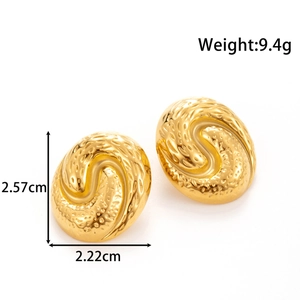 Golden titanium steel oval earrings with spiral texture and embossed vintage details