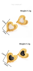 Detail showing dimensions of vintage heart earrings with gold textured edge and resin inlay