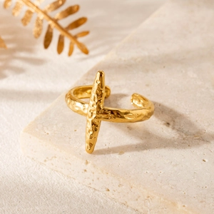 Adjustable golden stainless steel ring with cross motif and hammered metal texture