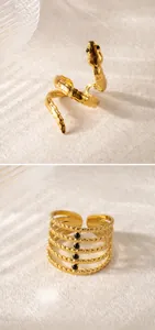 Detalle de anillo de serpiente dorado y banda de varias capas con piedras negras