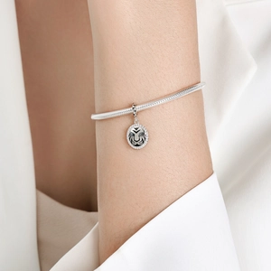 925 silver snake chain bracelet with white zircon pave tiger charm and black enamel detailing