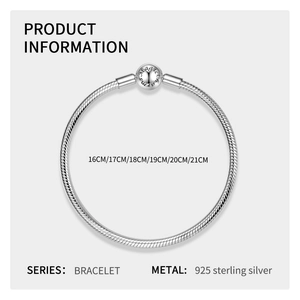 Detail of 925 sterling silver snake chain bracelet with Magic Charms engraved ball clasp
