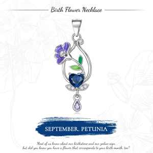 Detailed close-up of September birthstone necklace with purple petunia flower and blue heart gem