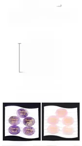 Detailed view of polished Amethyst and Rose Quartz palm stones with gold engraving