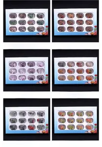 Detailed grid view of twelve carved gemstone elephant figurines in various natural minerals