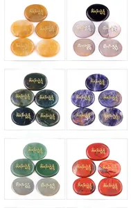 Detailed grid of six varieties of polished palm stones with gold Om Mani Padme Hum script