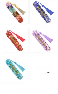 Detailed grid of resin bookmarks with natural crystal chips, gold accents and silk tassels