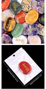 Polished natural palm stone with gold Om Mani Padme Hum engraving in clear packaging