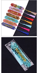Detailed set of 7 Chakra crystal resin bookmarks with silk tassels and golden symbols