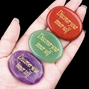 Handheld set of engraved quartz and amethyst worry stones with inner self text