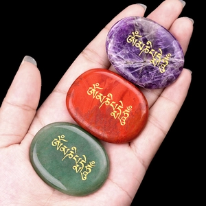 Three Om Mani Padme Hum palm stones in amethyst, red jasper, and green aventurine